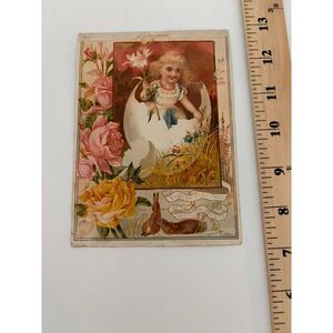 WOOLSON SPICE CO. VICTORIAN EASTER GREETINGS TRADE CARD.  GIRL IN EGG